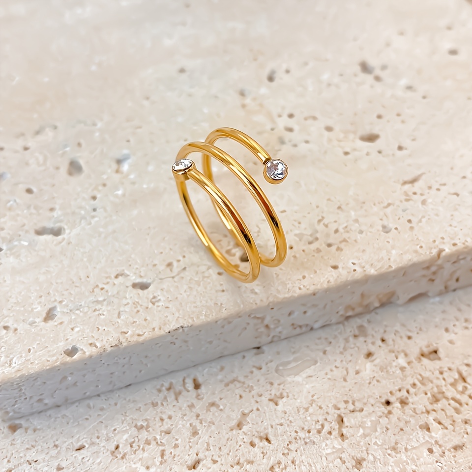 Carnival Stainless Steel Twisted Band Ring with Sparkling Artificial Stone